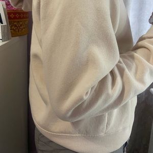 Beige hoodie with palm design; size L yet petite